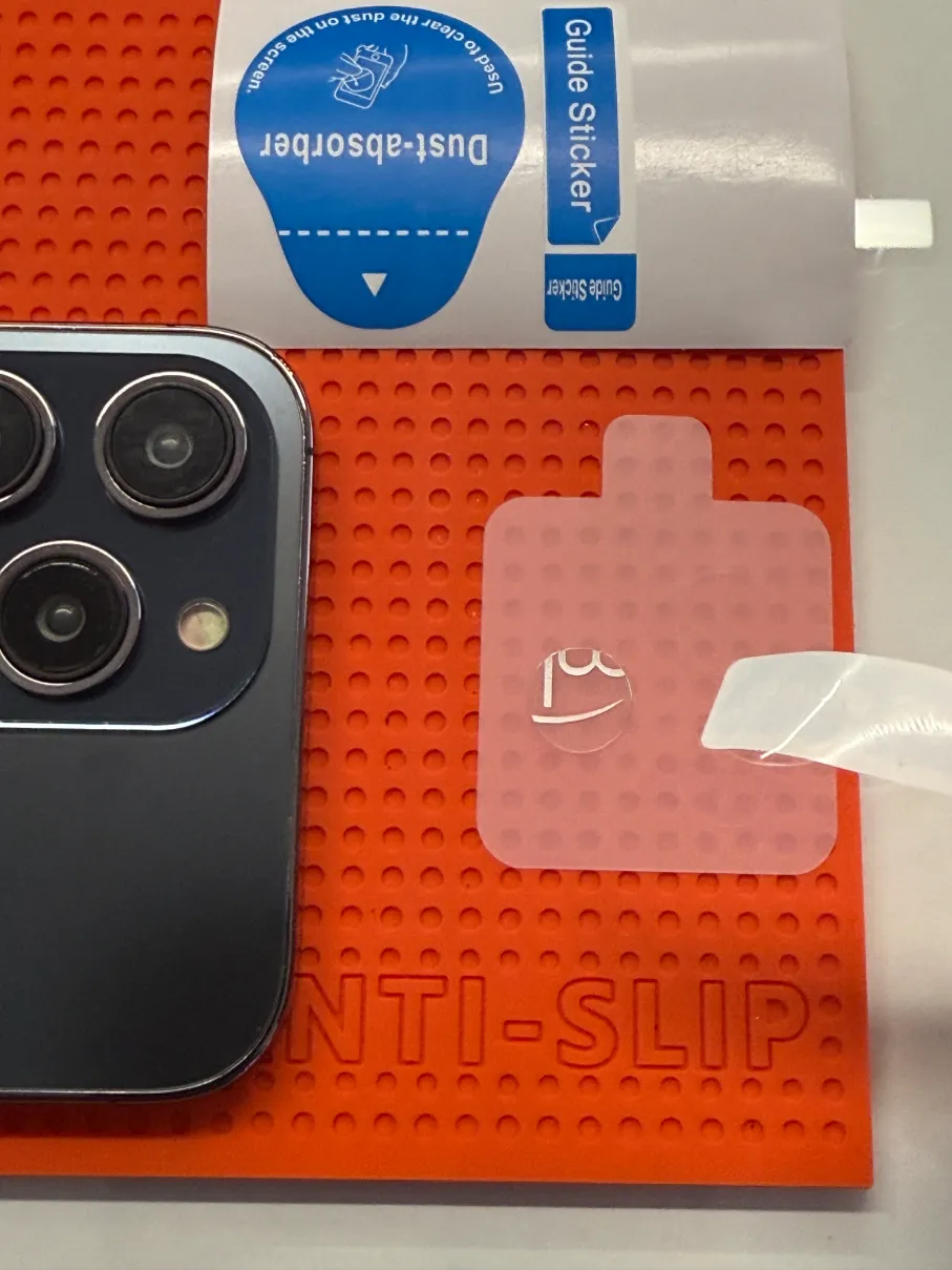 Removing the top protective layer with a helper sticker