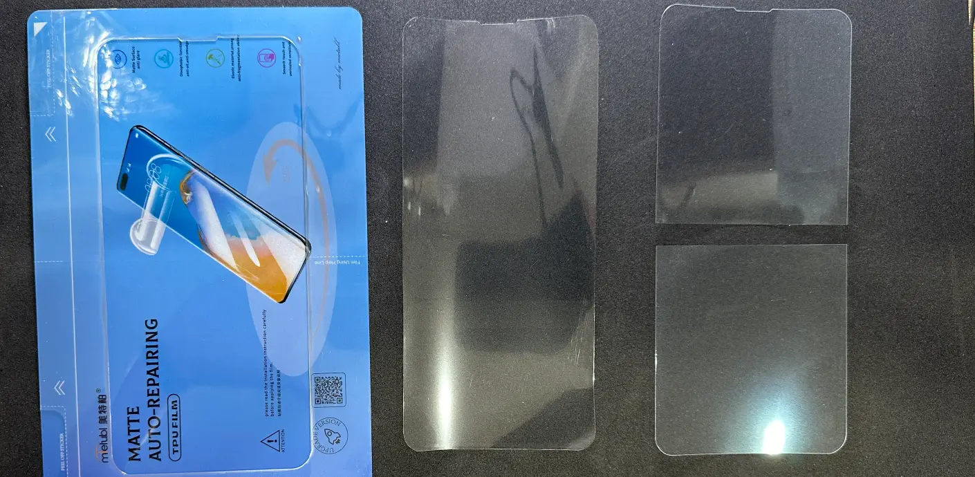 Carrier layer on the left, two-part rear protective layer on the right, top protective layer in the middle